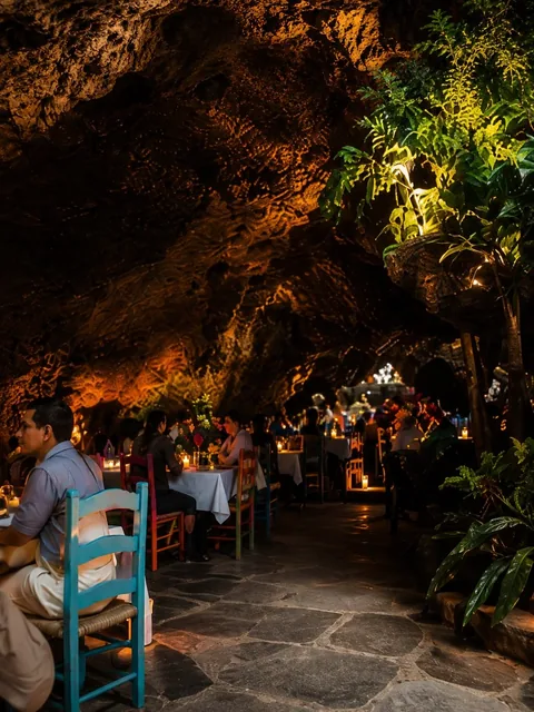 Diners at their tables at La Gruta Teotihuacan in the evening